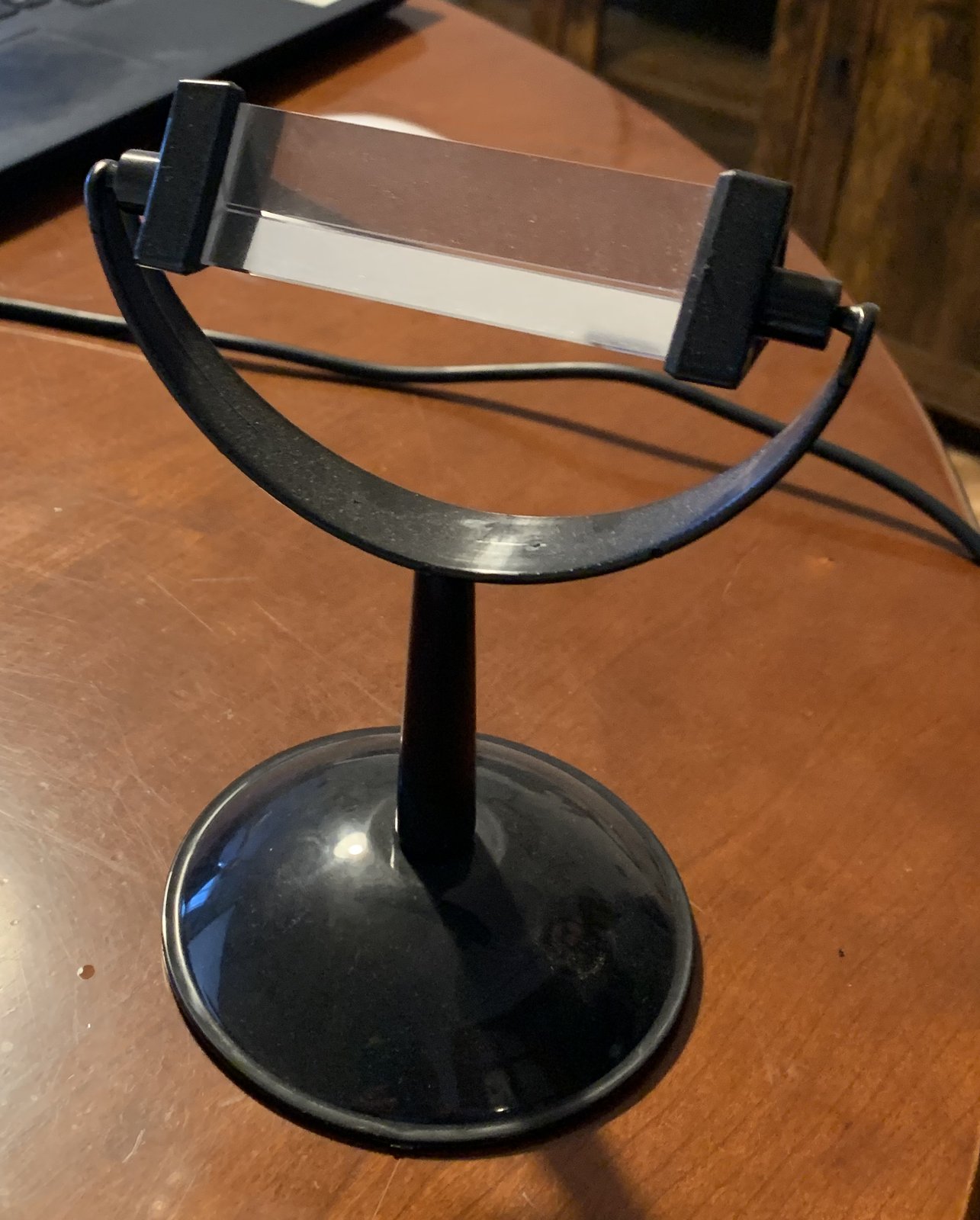Prisma óptico con soporte giratorio