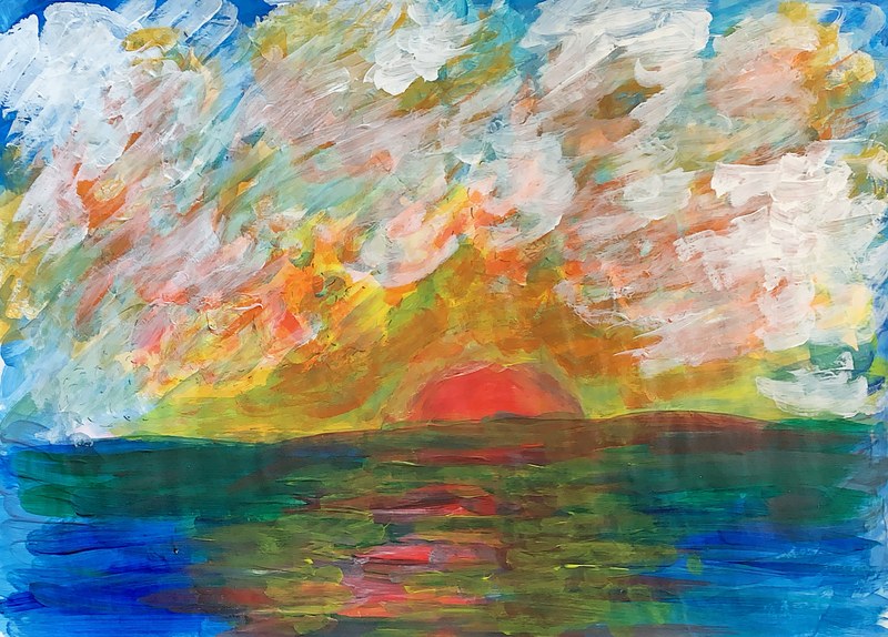 La puesta de sol entre nubes